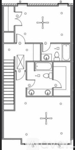 A floor plan of a house with a kitchen, living room, and two bedrooms.