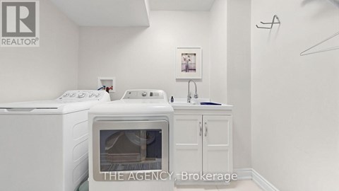 A white fridge and oven in a small kitchen.