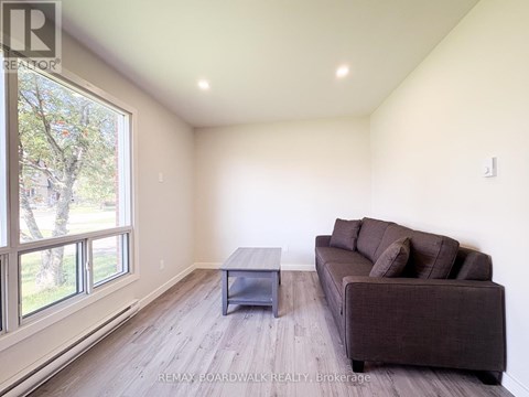 A living room with a couch and a coffee table.