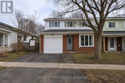 A house with a garage door is for sale in Brokerage.