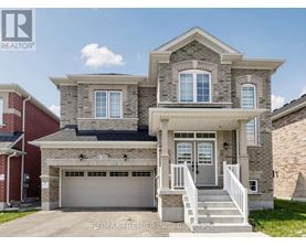 A two-story house with a garage is for sale.