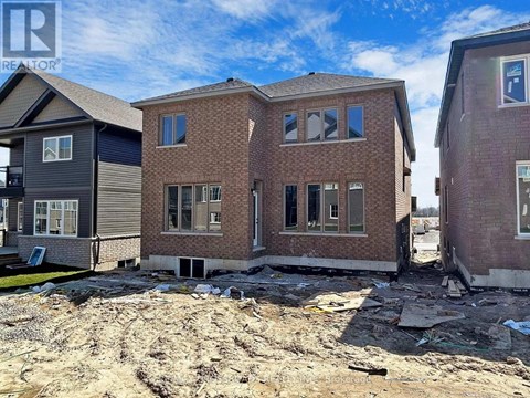 A realtor logo is visible on a building under construction.