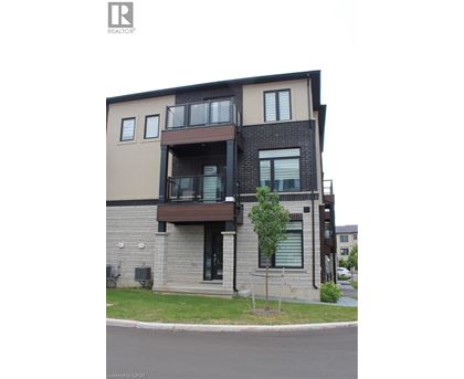 A modern two story apartment building with balconies.
