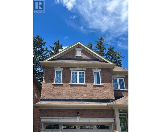 A house with a sign that says "DL Realty Inc, Brokerage".