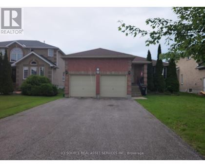 A house with a driveway in front of it.