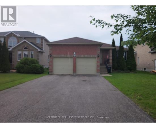 A house with a driveway in front of it.