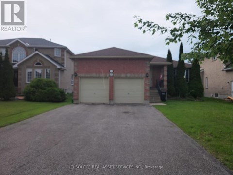 A house with a driveway in front of it.