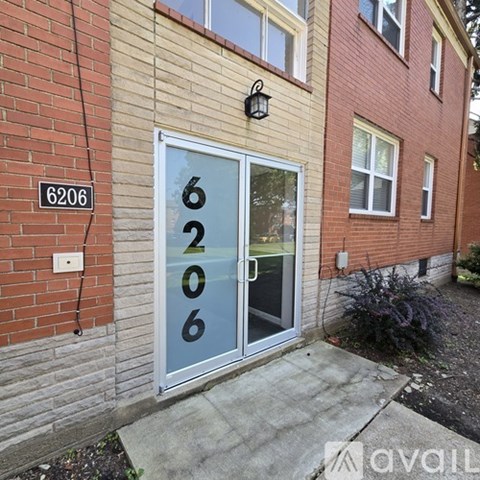A glass door with the number 6206 on it.
