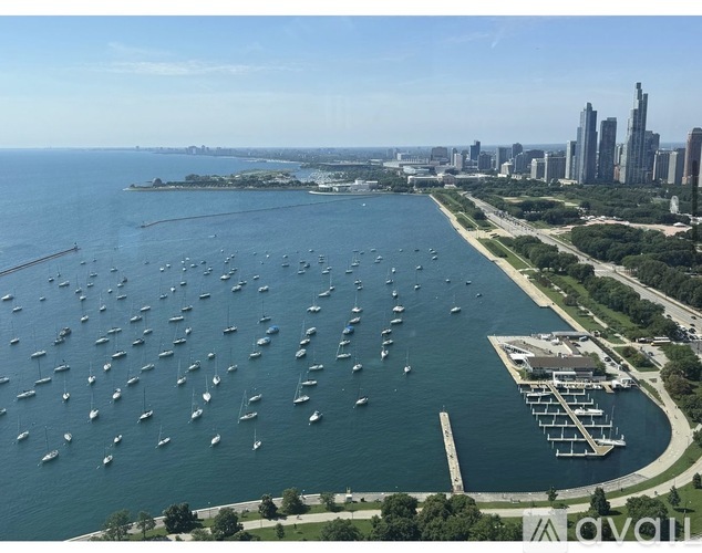 A large body of water filled with lots of boats.