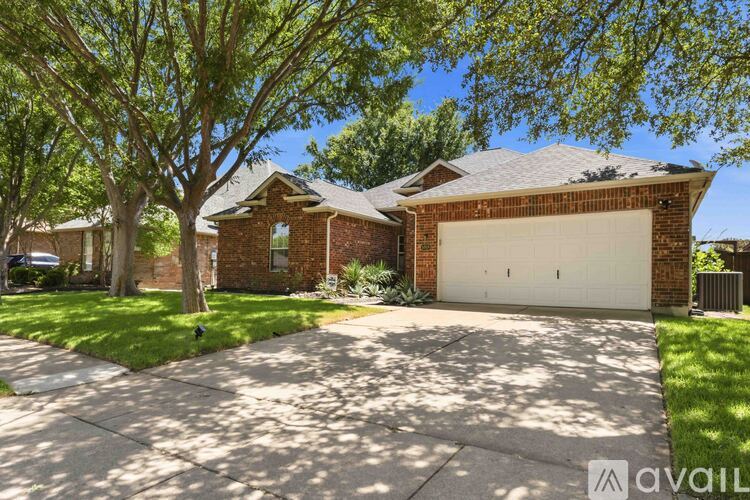A house with a garage is available for sale.