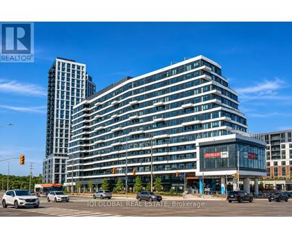 A modern multi-story building with a glass facade is the main focus of the image.
