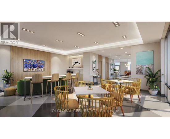 A modern dining room with a large table and chairs.