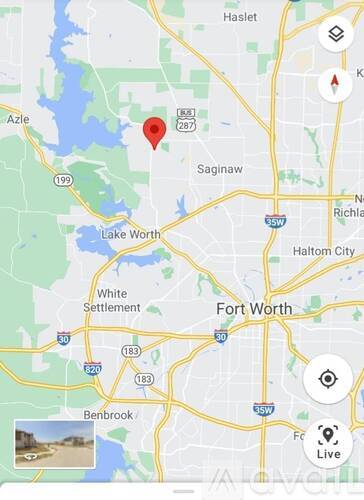 A map with a red pin on it.