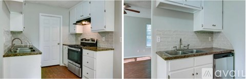A kitchen with white cabinets and a marble countertop.
