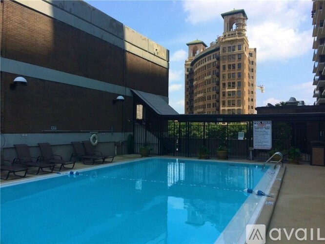 A pool with a sign that says "available" in the foreground.