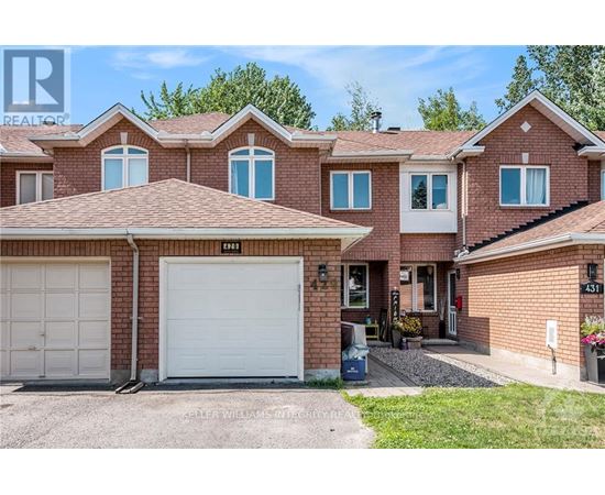 A house with a white garage door is for sale.