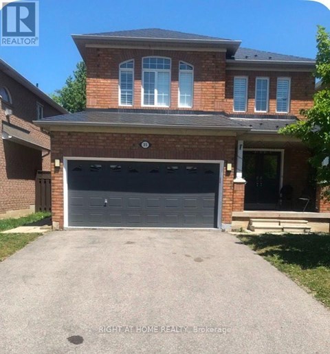 A house with a garage is for sale at Right at Home Realty Brokerage.