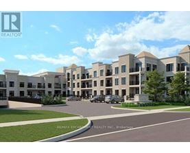 A rendering of a modern apartment complex with a clear blue sky in the background.