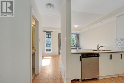 A kitchen with a dishwasher and a sink.