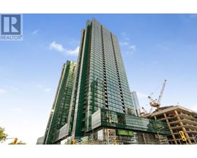 A tall building under construction with a clear blue sky in the background.