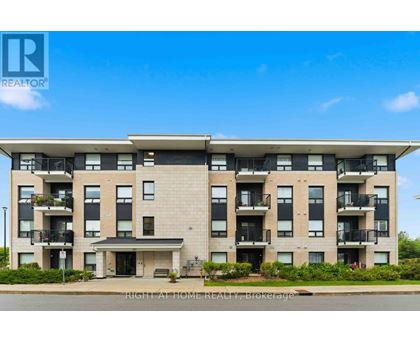 A large apartment building with a balcony on the second floor.