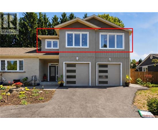 A house with a grey front and a red rectangle drawn on it.