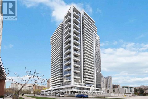 A tall residential building with a blue car parked in front.