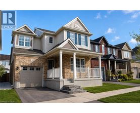 A large house with a garage is for sale.