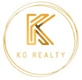 A logo with the text "KO REALTY" in a circle.