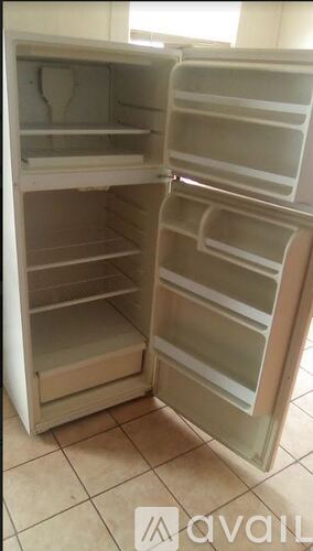 A white refrigerator with the door open is available for purchase.