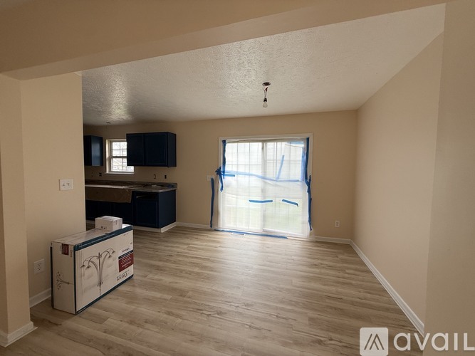 A room with a washing machine in it.
