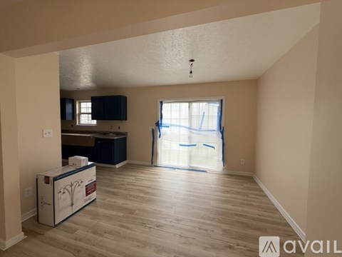 A room with a washing machine in it.