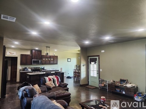 A living room with a couch and a coffee table.