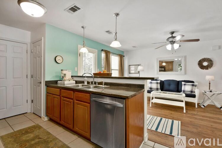 A kitchen with a dishwasher and a sink.