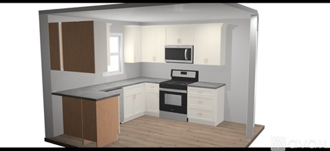 A kitchen with a black stove top oven and white cabinets.
