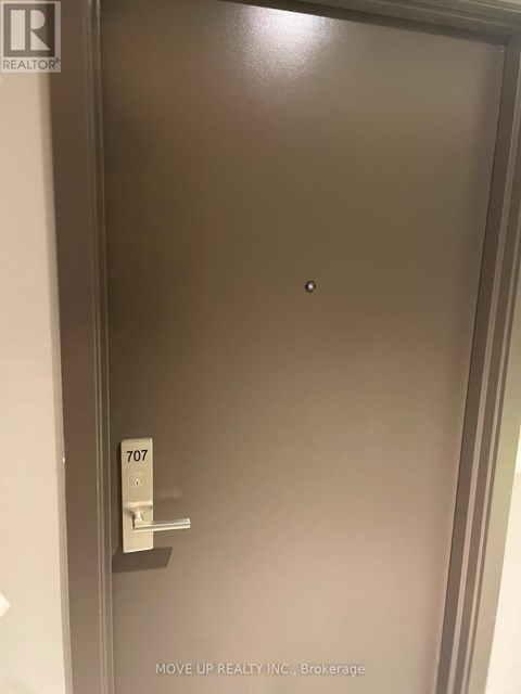 A door with the number 707 on it.