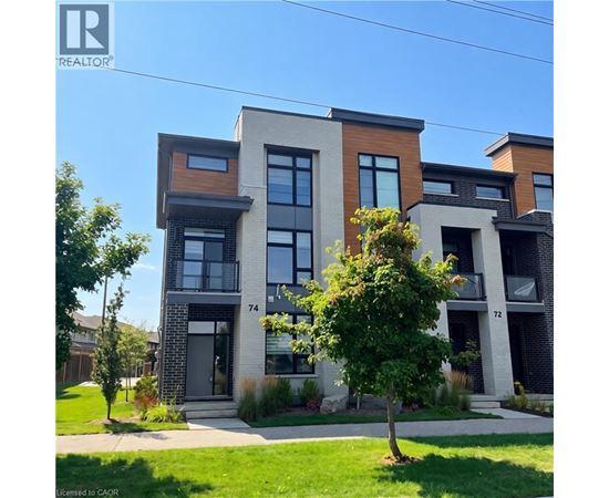 A modern two-story building with a balcony on the second floor.