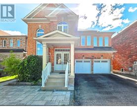 A house with a garage and a front porch is for sale.