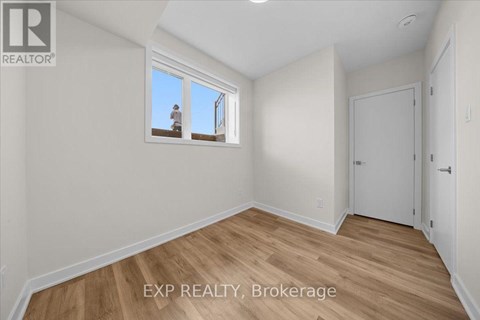 A room with EXP REALTY, Brokerage watermark.