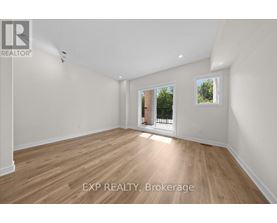 A room with EXP REALTY, Brokerage written on the floor.