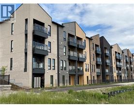 Apartment buildings with balconies and doors are lined up in a row.