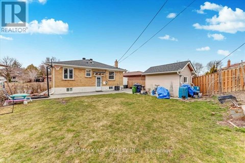 A house with a yard is for sale.