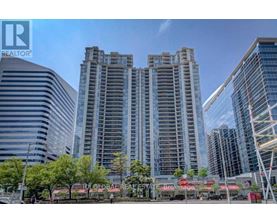 A cityscape with a tall building in the center and a sign that reads "REALTOR".