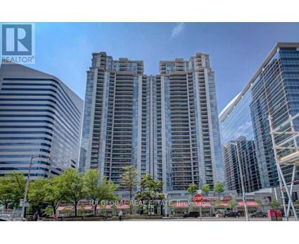 A cityscape with a tall building in the center and a sign that reads "REALTOR".