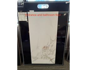 A white marble floor tile for entrance and bathroom.