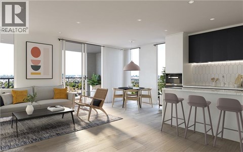 A modern living room with a grey sofa, a wooden chair, and a bar area with stools.
