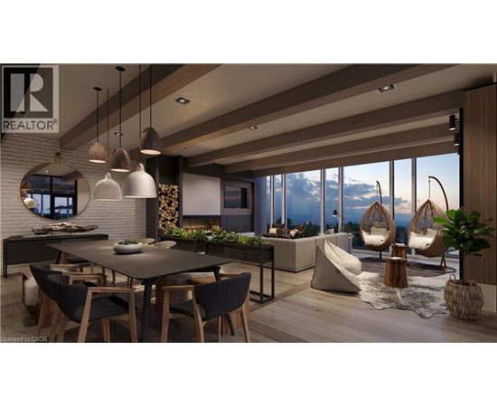 A modern dining room with a large table and chairs.
