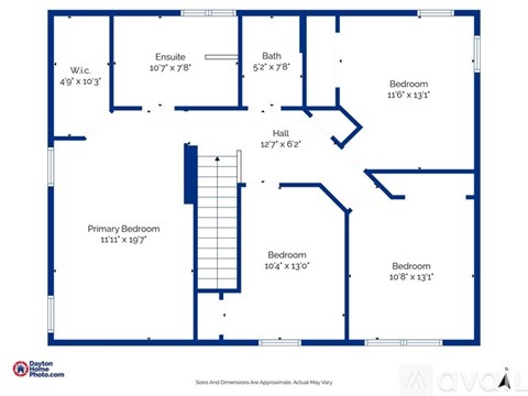 A floor plan of a house with a primary bedroom, two additional bedrooms, an ensuite, and a bathroom.