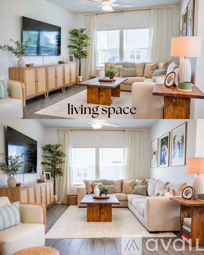 A living room with a white couch and a wooden coffee table.