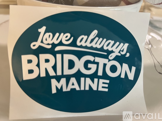 A sticker that says "Love always, Bridgton Maine" is displayed.